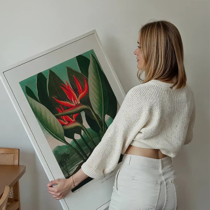 The Queen Plant by Robert John Thornton Print held up against a living room wall