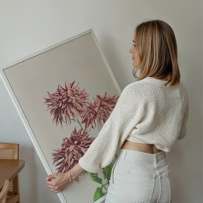 Three Pink Chrysanthemums Ogawa Kazumasa Flowers Print held up against a living room wall