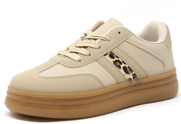 A beige  trainer with stripe details and a platform sole.