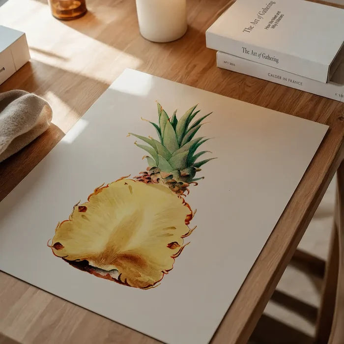 Vintage Half Pineapple Fruit Illustration Print unframed on a home office desk