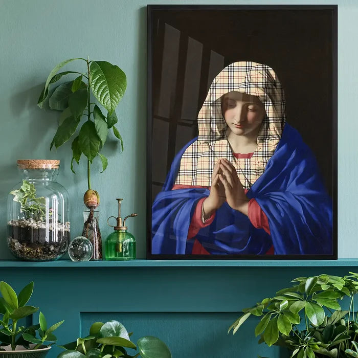 Virgin Mary Fashion Hood Print, quirky altered art print black framed on a living room shelf