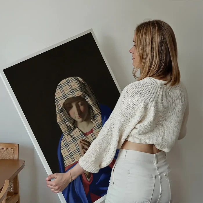 Virgin Mary Fashion Hood Print held up against a living room wall