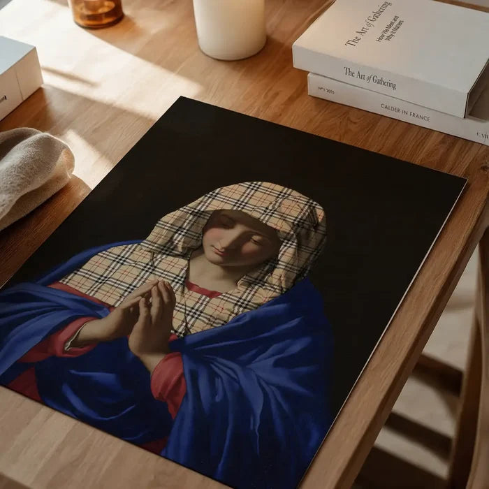 Virgin Mary Fashion Hood Print, quirky altered art print unframed on a home office desk