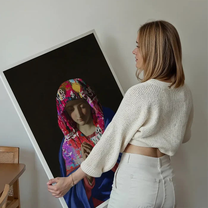 Virgin Mary Graffiti Hood Print held up against a living room wall