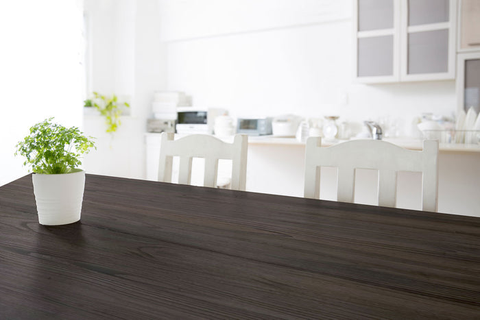 Retique It Weathered Finish Kit in Charcoal for wood furniture, showing a textured, aged wood surface with a weathered look.
