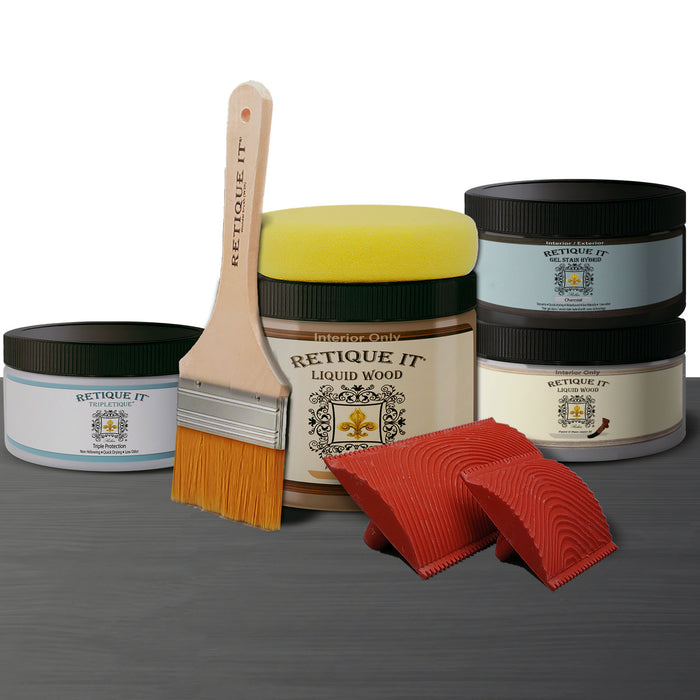 Retique It weathered finish kit in charcoal for wood, showing textured, aged wood surface with a weathered, charcoal appearance.