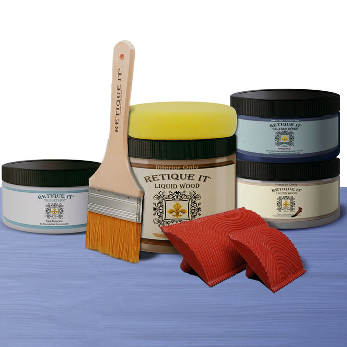 Weathered Finish Kit in Vintage Blue by Retique It showing wood with a distressed, blue-toned weathered look and matching finishing tools.