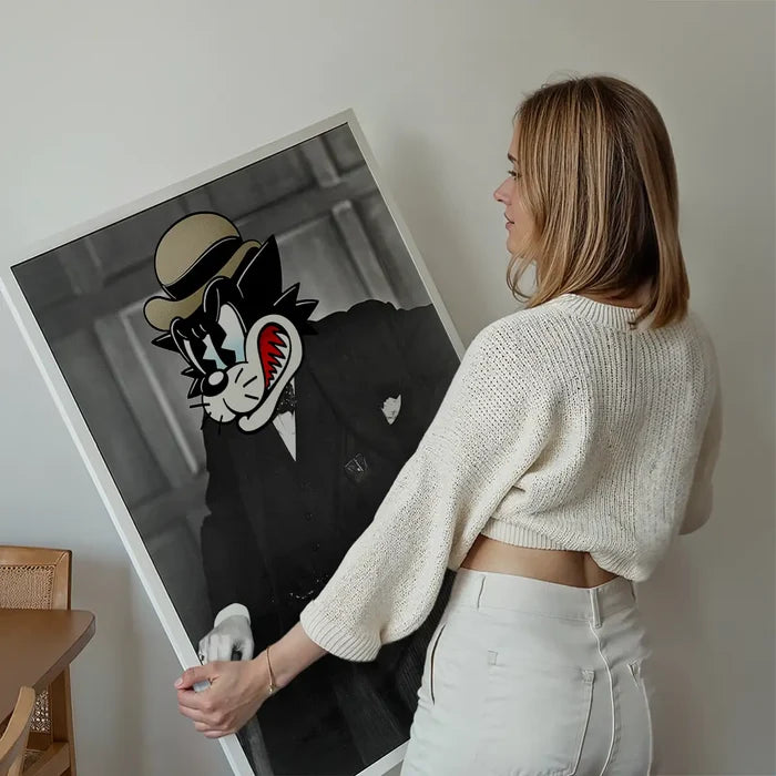 Winston The Cat Portrait Print held up against a living room wall
